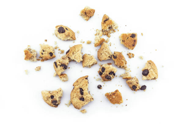 istock Cookies chocolate broken into pieces on white background. 1184136259