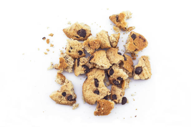 istock Cookies chocolate broken into pieces on white background. 1184136267