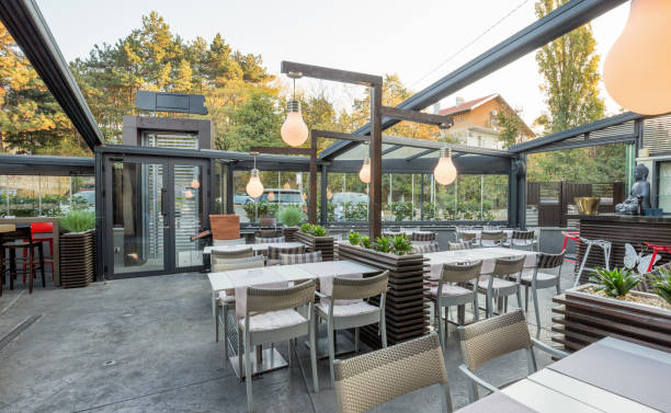 istock Restaurant with large open garden interior 1184138388