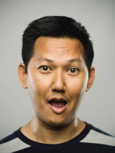 istock Portrait of real malaysian man with surprised expression 1184138479