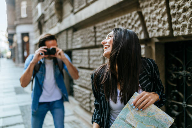 istock Couple of tourists 1184141140