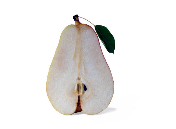 Ripe yellow halve of  pear  fruit with green leaf isolated on white background