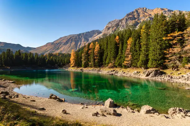 Beautiful mountain lake with green blue water. Lake Obernberg is a mountain lake located in the Stubai Alps in Tyrol, Austria.