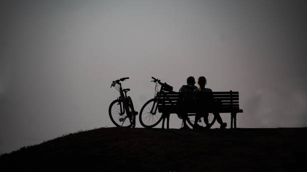 istock Young couple enjoy after ride bicycle 1184150784