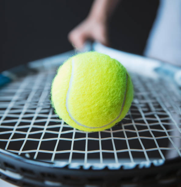 istock Tennis racket and ball 1184153177