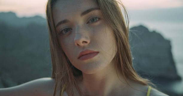 istock Young girl posing on the mountain top 1184153547