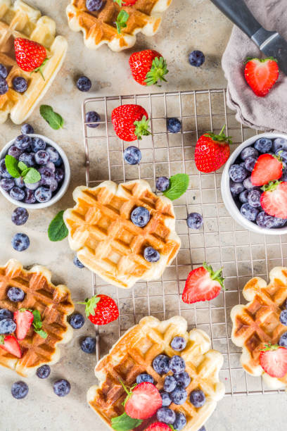 istock Sweet Homemade Belgian Waffles with Berries 1184157735