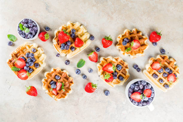 istock Sweet Homemade Belgian Waffles with Berries 1184157746