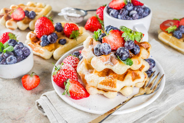 istock Sweet Homemade Belgian Waffles with Berries 1184157766