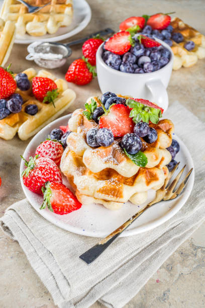 istock Sweet Homemade Belgian Waffles with Berries 1184157771