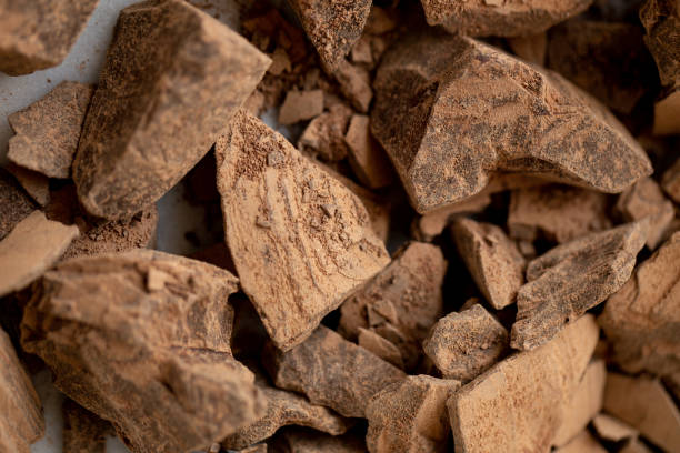 istock Chocolate Shavings. Raw cacao mass. Raw vegan chocolate 1184158034