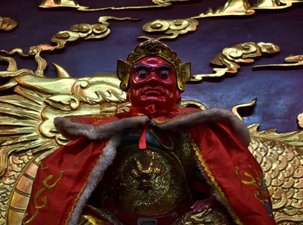 istock Red faced god statue at a Chinese temple 1184159509