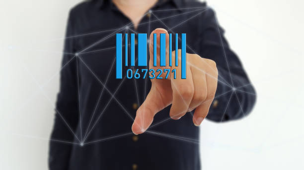 istock Businesswoman using barcode on digital network hologram 1184161023