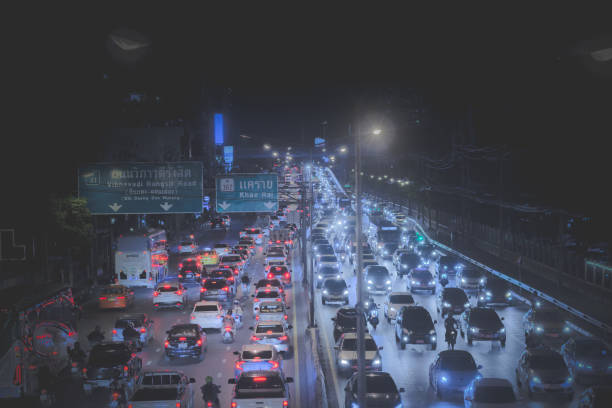 istock The light from the car stuck on the road at night 1184163143