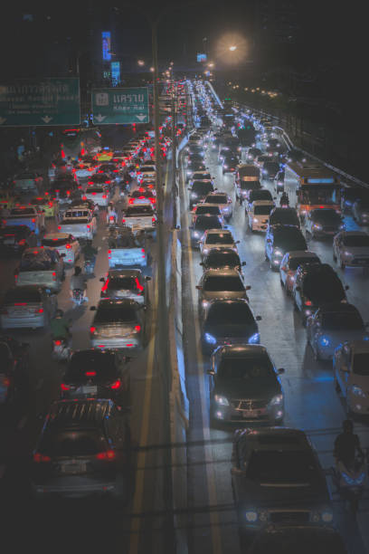 istock The light from the car stuck on the road at night 1184163216