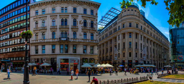 Budapest, Hungary - May 23, 2019: Tourists and visitors on the famous Vorosmarty Plaza - the center of Down Town -, one of the main shopping areas in Budapest.
