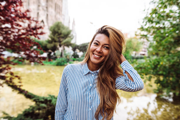 istock happiness woman in barcelona 1184166130