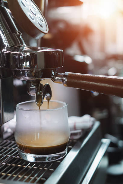 istock Close-Up of coffee machine making a cup of coffee. 1184166541