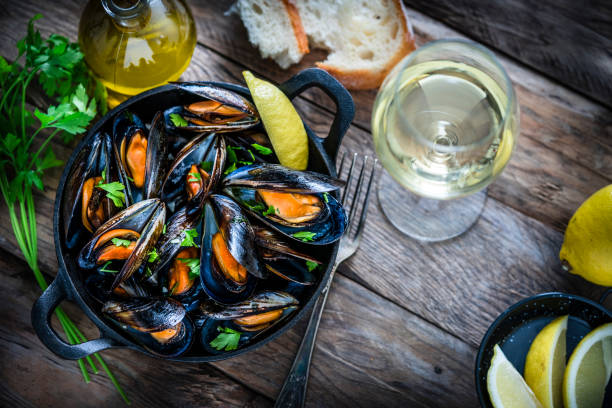 Steamed mussels in a cooking pan
