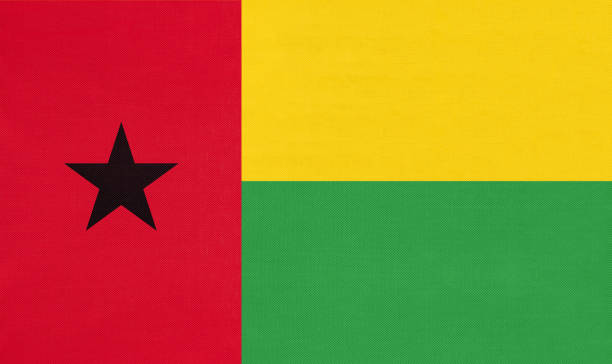 republika gwinei bissau national fabric flaga, tło tekstylne. - guinea bissau flag zdjęcia i obrazy z banku zdjęć