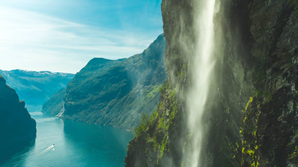Following waterfall in geirangerfjord