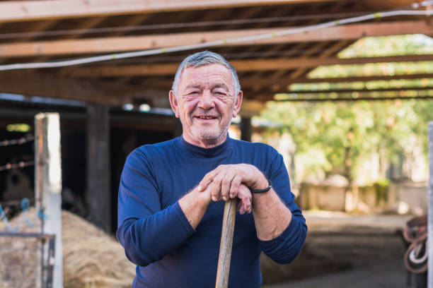 istock Portrait of confident farmer. 1184171281