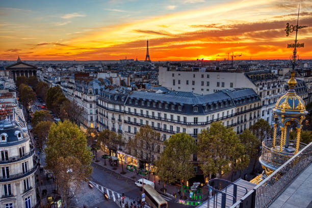 istock Aerial view of Illuminated Paris at Dusk with Eiffel Tower 1184175576