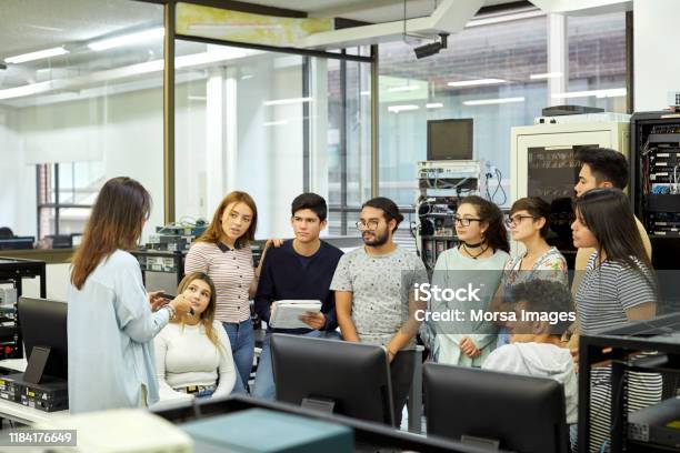 Computing Lab Female Student Female Teacher Teaching Students In Computer Lab Stock Photo - Download ...