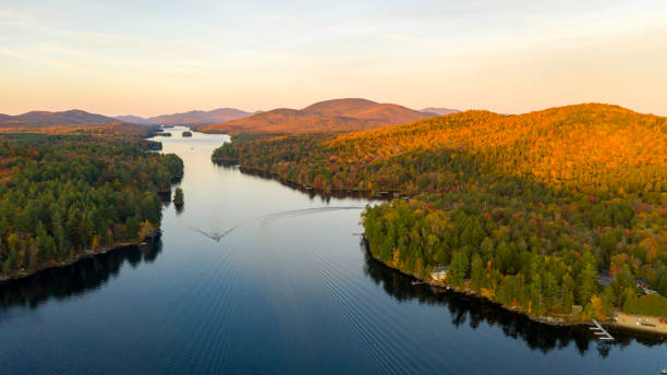 aerial view over long lake adirondack park mountains new york usa - long imagens e fotografias de stock