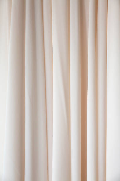 istock pink background of fine fabric 1184179256