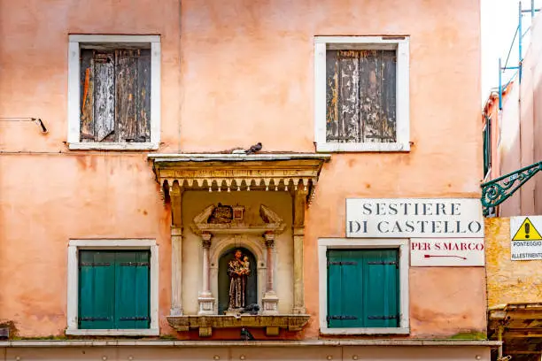Photo of Old buildings on the side of a canal in Venice