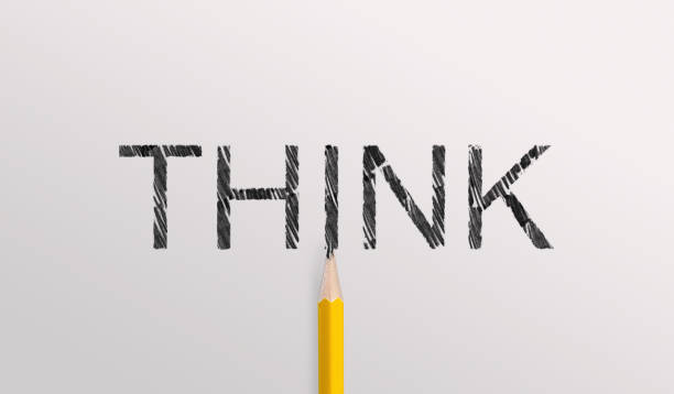 istock Inscription think on white background with pencil 1184180362