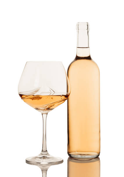 istock bottle and glass with white wine 1184181968