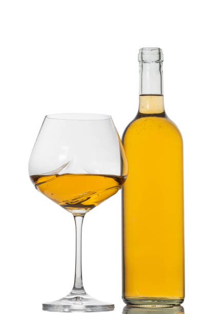 istock bottle and glass with white wine 1184183150