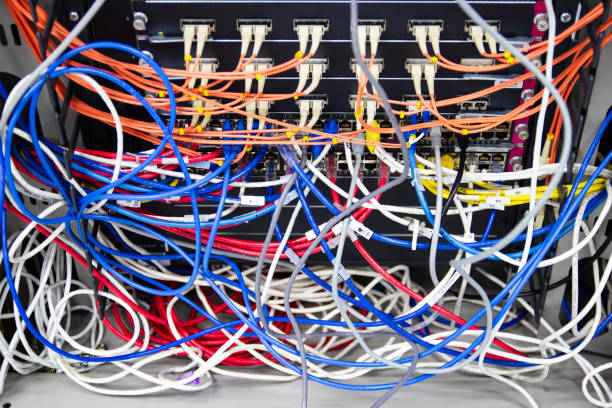 istock cable network in server room cable tangled of poorly routed cables 1184183332
