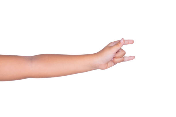 istock Little Boy doing rock horn hand gesture 1184183754