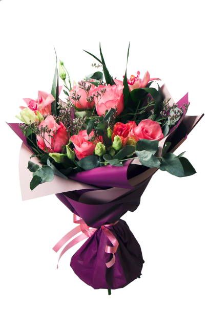 istock bouquet from roses enveloped violet paper 1184184727