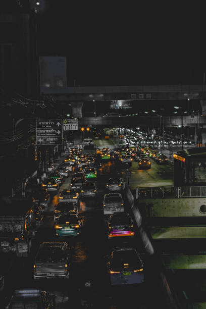 istock The light from the car stuck on the road at night 1184184757