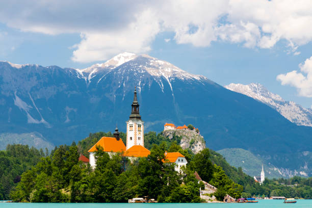 istock Lake Bled with mountains in Slovenia 1184184940