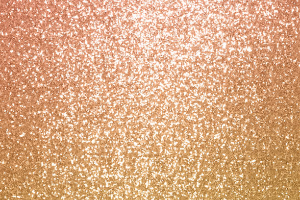 istock Sparkling pink, caramel, sequin textile background. Fashion fabric glitter, sequins 1184194525