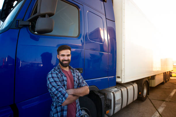 トラック運転手の職業。 - truck semi truck blue truck driver ストックフォトと画像