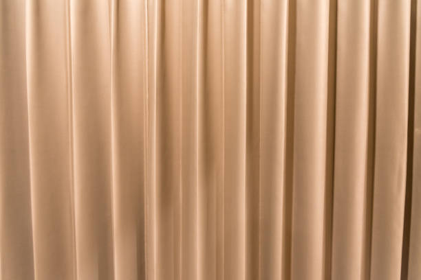 istock Golden curtains and shining lights 1184197971