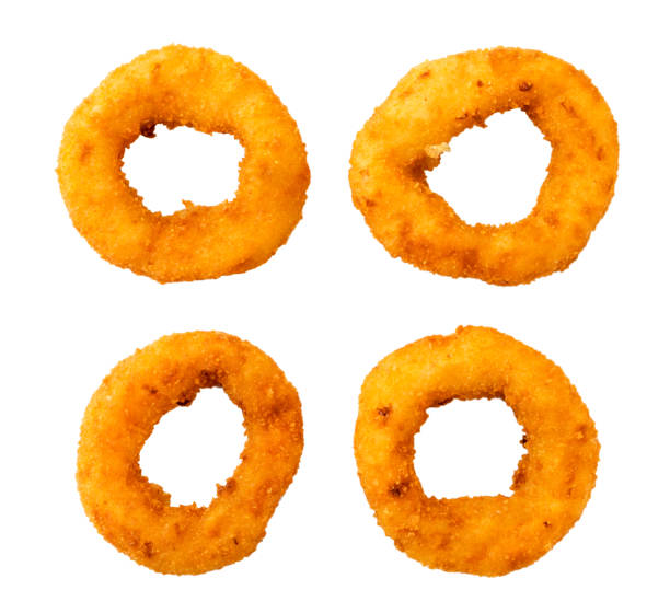 Set of fast food onion rings on a white, isolated. The view of the top. Set of fast food onion rings on a white background, isolated. The view of the top. fried onion rings stock pictures, royalty-free photos & images