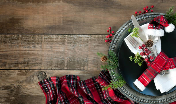 istock Holiday Christmas Dining Plate on an Old Wood Table 1184201551