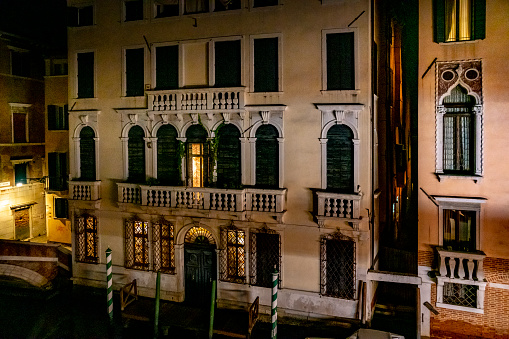 Gondolas with San Giorgio Maggiore at night, Venice, Italy