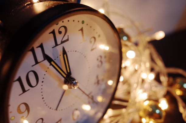 istock Festive Chritmas background. Clock with christmas for time 1184209280
