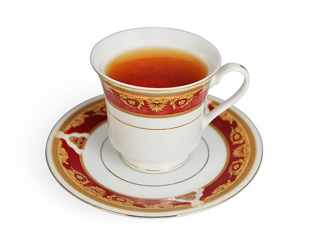 чашка чая - two objects cup saucer isolated стоковые фото и изображения