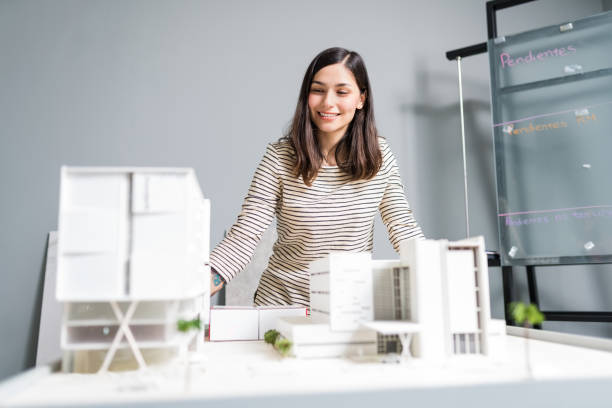 istock Confident Architect Admiring New Project At Office 1184210820