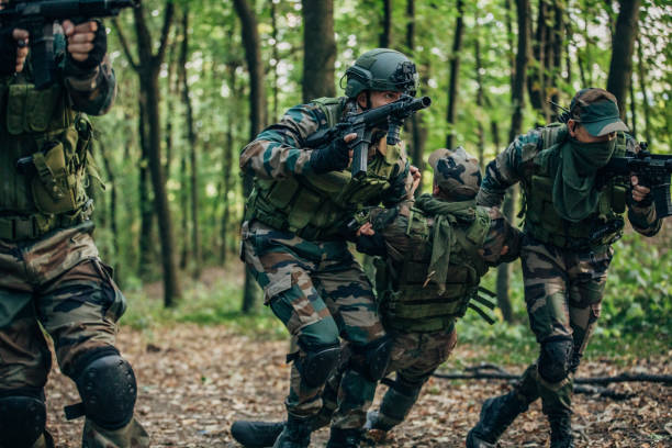 istock Soldiers Carrying Injured Man 1184210865