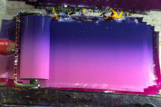 Mixing colors using a roller to roll over the ink.